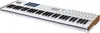 A white MIDI keyboard with black keys and wood-grain accents on the sides, shown at a diagonal angle against a white background. Produktbild-Vorschau