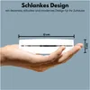 A hand holding a white smoke detector with dimensions indicated. Produktbild-Vorschau
