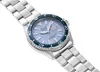 A close-up studio shot of a silver and blue Orient watch against a white background. Voir les images du produit