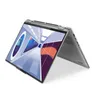 A silver laptop is shown in a studio setting, angled to display its screen and hinge. Produktbild-Vorschau
