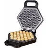 An open bubble waffle maker with freshly baked waffles inside, on a white background. Produktbild-Vorschau