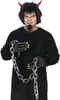 A person in a black furry costume with red horns and a chain. Anteprima dell’immagine prodotto