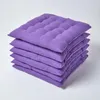 A stack of purple seat cushions on a white background. Náhled obrázku produktu