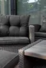 Close-up of a grey rattan garden furniture set with cushions, including a sofa, armchair, and table. Náhled obrázku produktu