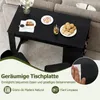 A black coffee table with food and drinks on it, placed in a living room setting. Náhľad obrázku produktu