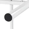 A close-up view of the end of a white metal bed frame with a black rubber foot. Produktbild-Vorschau