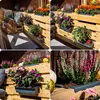 A collage of images showing planters filled with flowers and pumpkins on a wooden pallet structure, likely a balcony or patio. Náhľad obrázku produktu