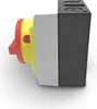 A side view of an electrical switch in a black housing, with red and yellow components visible on the left. Produktbild-Vorschau