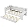 A white daybed with a pull-out trundle bed extended. Náhled obrázku produktu