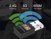 A close-up shot of a wireless USB adapter with a graphic overlay suggesting Wi-Fi signals. The background appears to be a person using a laptop. Produktbild-Vorschau
