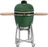 A green ceramic kamado grill on a silver stand with wooden side shelves, presented against a white background. Produktbild-Vorschau