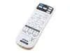 A white remote control for a projector, shown at an angle on a white background. Náhled obrázku produktu