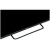 A close-up view of the bottom part of a black television with its stand. Produktbild-Vorschau