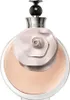 A close-up studio shot of a perfume bottle. Voir les images du produit