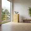 A modern interior with a large window overlooking a Japanese-style garden. A wooden bench and a decorative sculpture on a pedestal are visible. Voir les images du produit