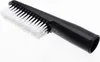 A black and white brush attachment against a white background. Produktbild-Vorschau