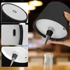 A hand holding a black wine stopper with a silver tip, with close-up insets of the product's features. Voir les images du produit