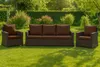 Outdoor furniture set on a lawn with bushes and trees in the background. Produktbild-Vorschau