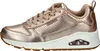 A side view of a single rose gold sneaker. Voir les images du produit