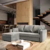 A modern living room with a sectional sofa, coffee table, and staircase. Produktbild-Vorschau