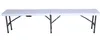 A white folding table with gray metal legs against a white background. Náhľad obrázku produktu