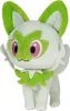 A plush toy of a cat-like creature with green accents. Produktbild-Vorschau