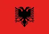 A flag of Albania displayed flat against a red background. Produktbild-Vorschau
