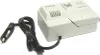 A white electronic device with a black cord and plug, isolated on a white background. Voir les images du produit