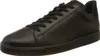 A black leather sneaker is shown from a side angle against a white background. Voir les images du produit