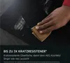 A hand is wiping a black surface with a cloth, showing a scratch-resistant feature. Anteprima dell’immagine prodotto