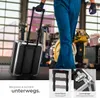 A person in work clothes is pulling a tool case with a telescopic handle in what appears to be a workshop or garage. Produktbild-Vorschau