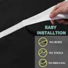 A close-up of a black fabric with a white velcro strap being held by a hand, with text overlays indicating easy installation and no rods, tools, or drilling required. Produktbild-Vorschau