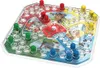 A Paw Patrol themed board game with colorful pawns and a dice popper. Produktbild-Vorschau
