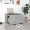 A modern entryway with a concrete-effect storage bench, a cushion, a plant, and slippers. Produktbild-Vorschau