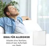 A man relaxing on a couch with his eyes closed, with text overlay and a product image in the corner. Produktbild-Vorschau