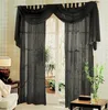 A set of black sheer curtains with a decorative valance draped over a curtain rod, covering a French door. Produktbild-Vorschau