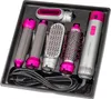 A hair styling kit with multiple attachments laid out in a black organizer tray. Produktbild-Vorschau