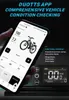A hand holding a smartphone displaying an e-bike app, with a close-up of the e-bike's display unit in the foreground. Produktbild-Vorschau