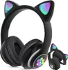 A pair of black headphones with cat ears and LED lights. Náhled obrázku produktu