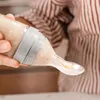 Haakaa Squeeze Fütter-Flasche mit Löffel - Grau Produktbild-Vorschau 5