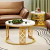 A living room scene with two coffee tables, a sofa, and a rug. Produktbild-Vorschau
