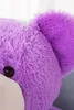 A close-up shot of a purple teddy bear's head and ear. Náhľad obrázku produktu