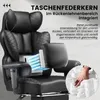 A close-up view of a black ergonomic gaming chair, highlighting its lumbar support system. Voir les images du produit