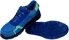 A pair of blue and green safety shoes are shown against a white background. One shoe is upright, and the other is lying on its sole. Produktbild-Vorschau