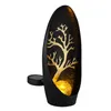 A black solar-powered garden lantern with a gold tree silhouette and a crackled glass ball inside, shown against a white background. Produktbild-Vorschau