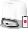 A white and gray docking station for a robot vacuum cleaner is shown with a smartphone displaying an app icon. Produktbild-Vorschau