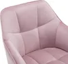 A close-up view of a pink velvet chair. Produktbild-Vorschau