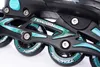 A close-up view of the wheels and frame of a pair of inline skates. Anteprima dell’immagine prodotto