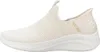A side view of a beige Skechers Slip-ins sneaker. Voir les images du produit
