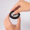 Hands holding a reusable coffee filter. Produktbild-Vorschau